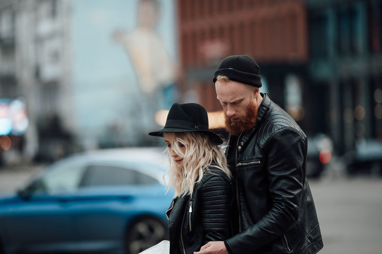 Young couple on street in city