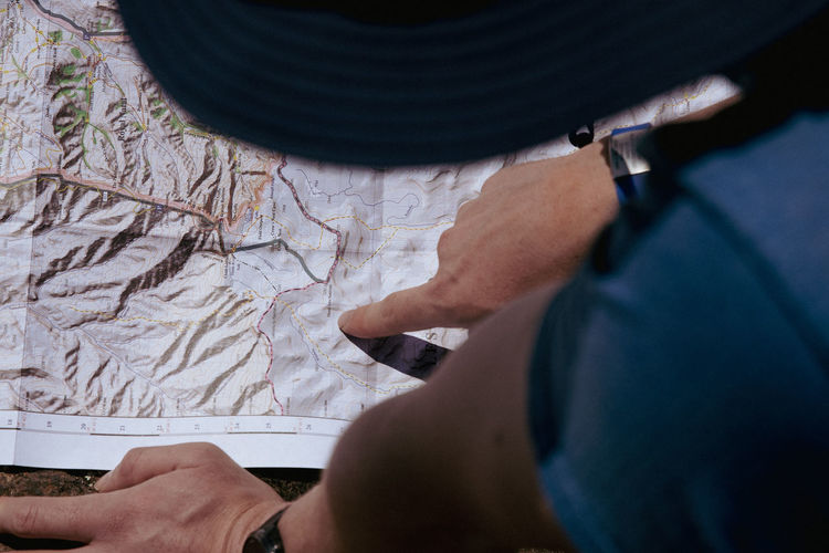 Man reading a map. 