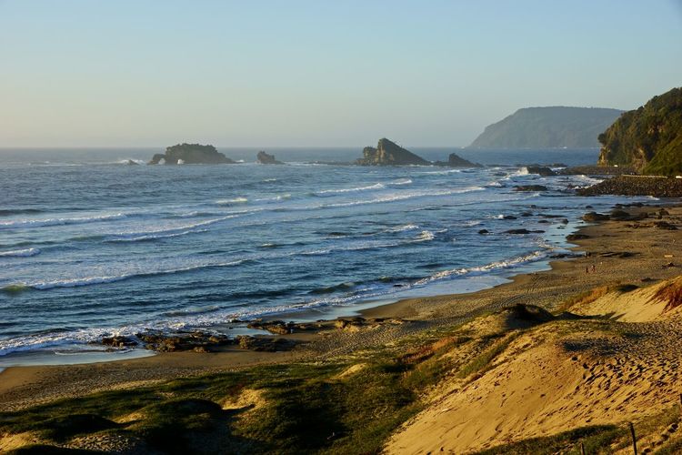 Scenic view of sea against clear sky