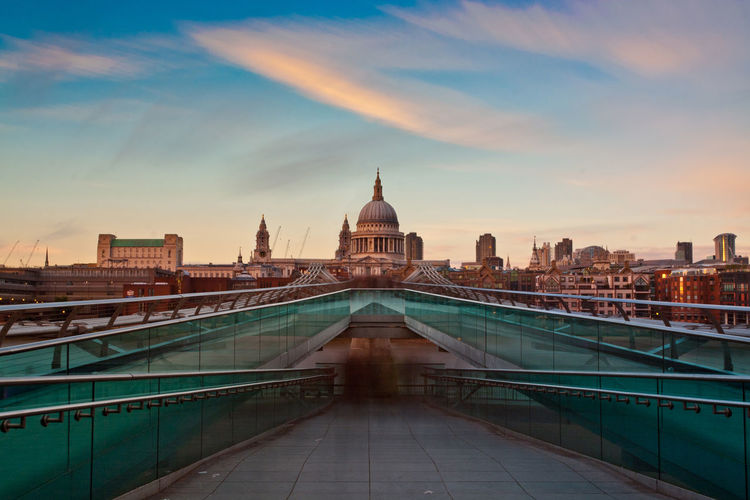 St paul's cathedral overlooking the millennium bridge and the river thames, london.