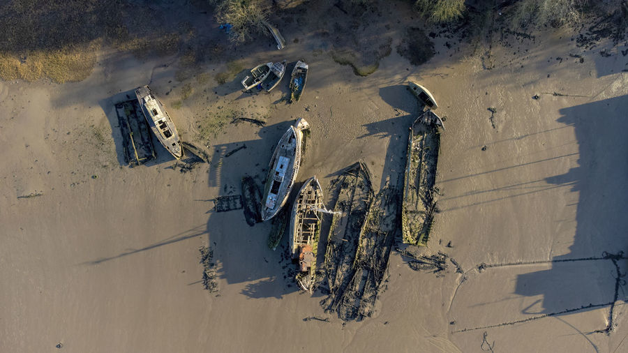 An aerial view of the remains of old boats on the river orwell at pin mill, suffolk, uk