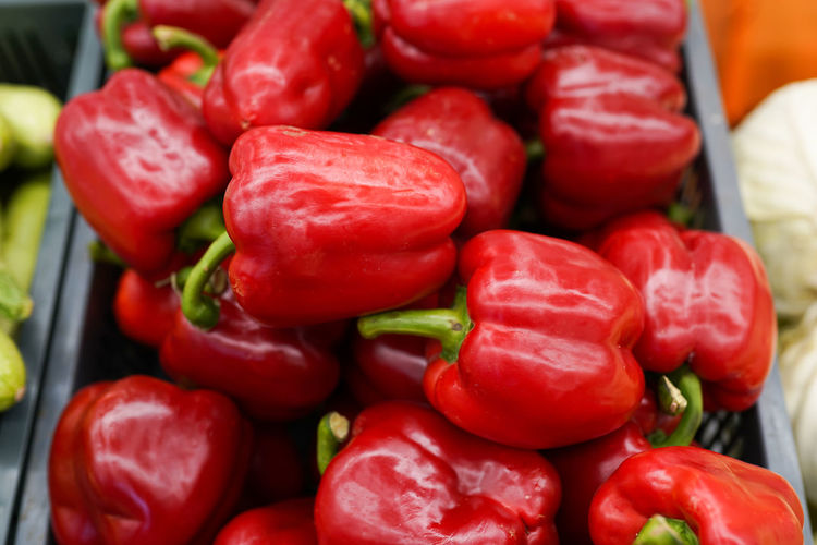 Fresh red sweet bell peppers on the market.