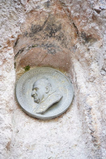Close-up of sculpture on rock