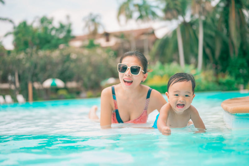 Portrait of shirtless boy in swimming pool