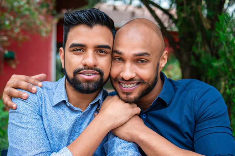 Portrait of smiling gay couple