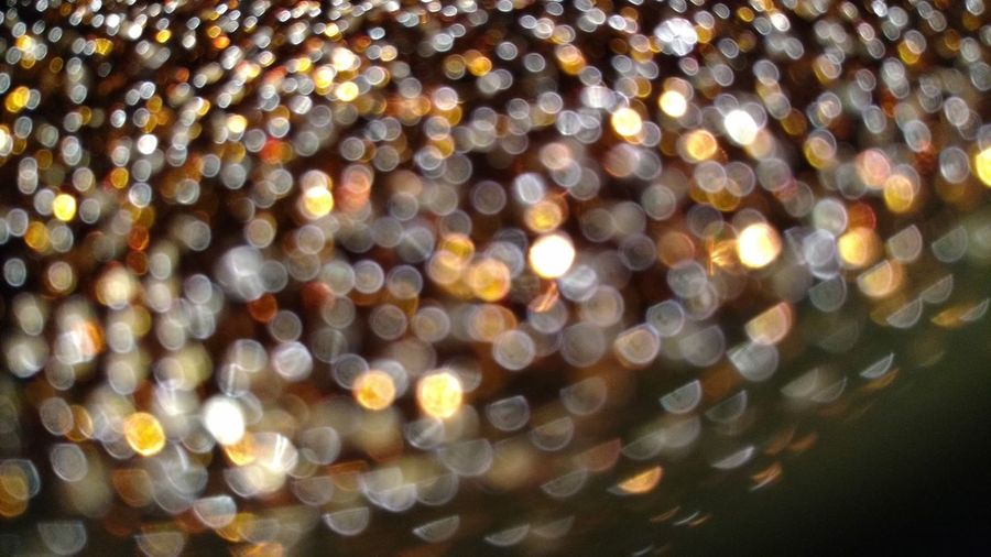Defocused image of illuminated christmas lights