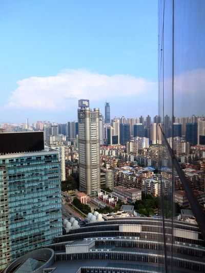 Cityscape against blue sky