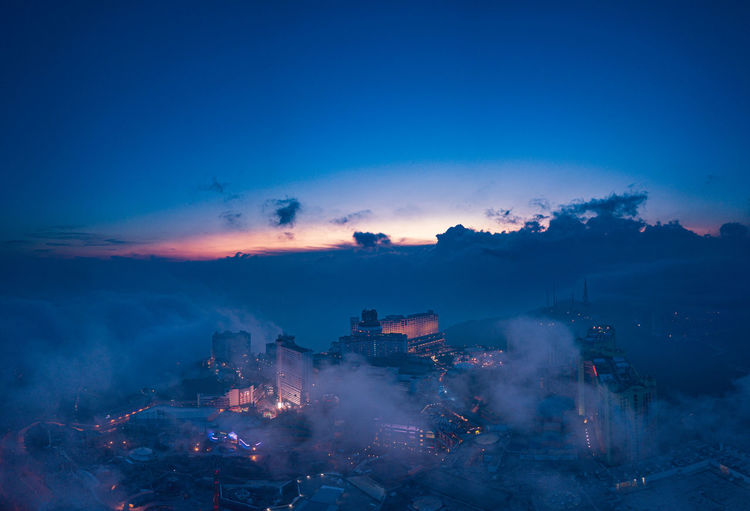 High angle view of buildings against sky during sunset in genting highlands malaysia 