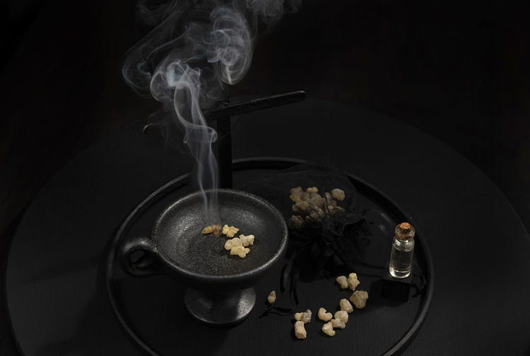 High angle view of breakfast on table against black background