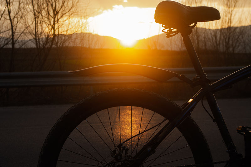 View of bicycle during sunset