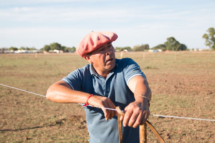 Portrait of farmer in field