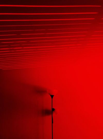Full frame shot of illuminated red light