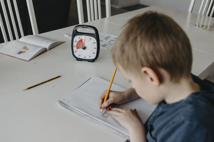 Schoolboy doing homework
