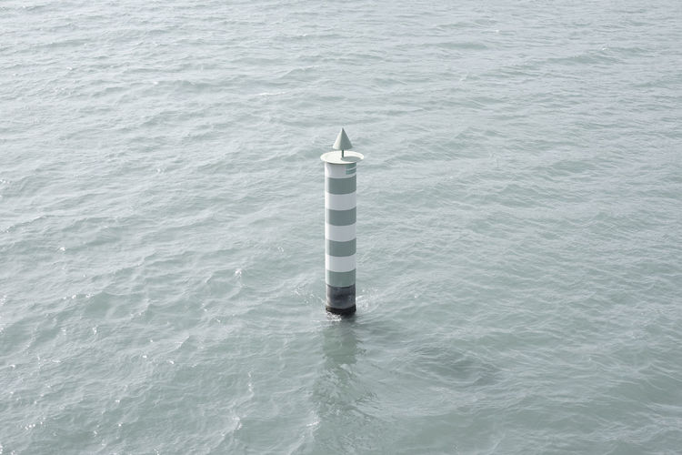High angle view of lighthouse on sea