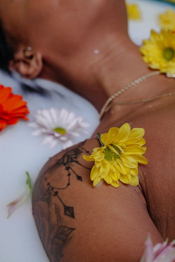 Low section of woman with henna tattoo