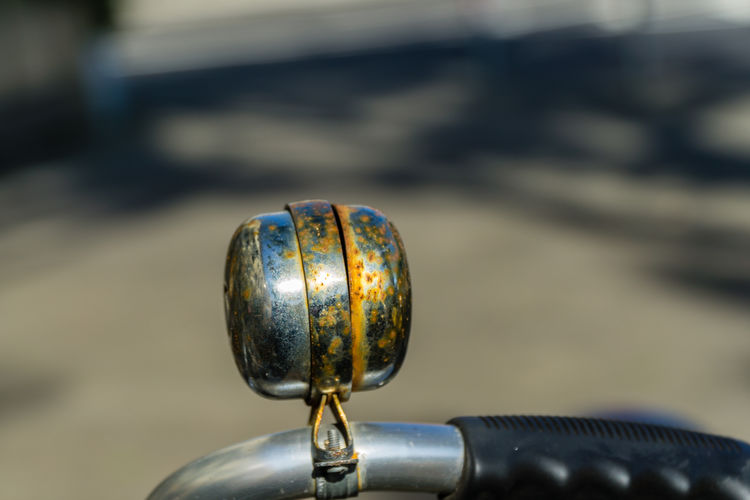 Close-up of rusty bicycle bell