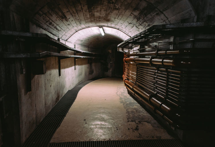 Illuminated tunnel in building