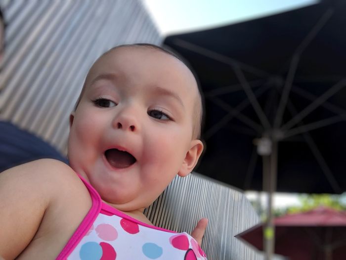 Low angle view of cute baby girl