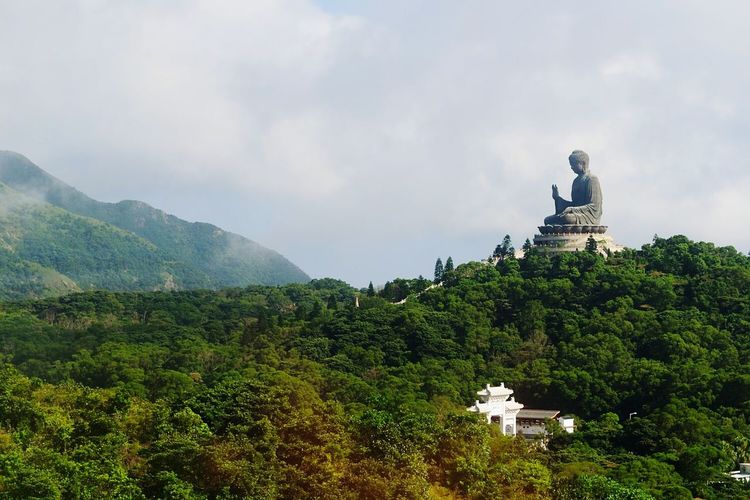 High angle view of tian tan buddha against cloudy sky