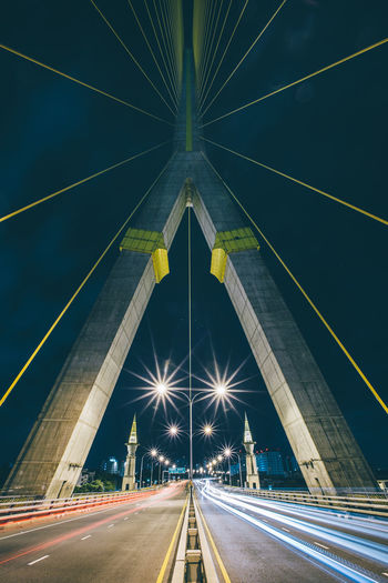 Light trails on bridge at night