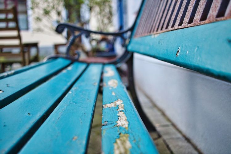 Close-up of old empty bench