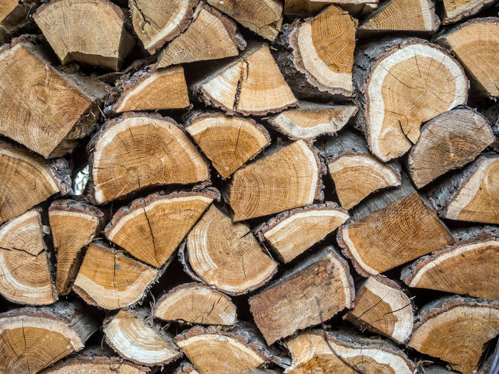Closeup of piled and chopped oak firewood