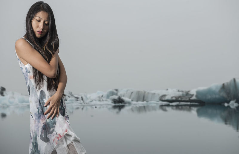 Beautiful woman posing for fashion photoshoot at glacierlagoon