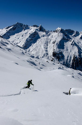 High angle view of person skiing on snow landscape