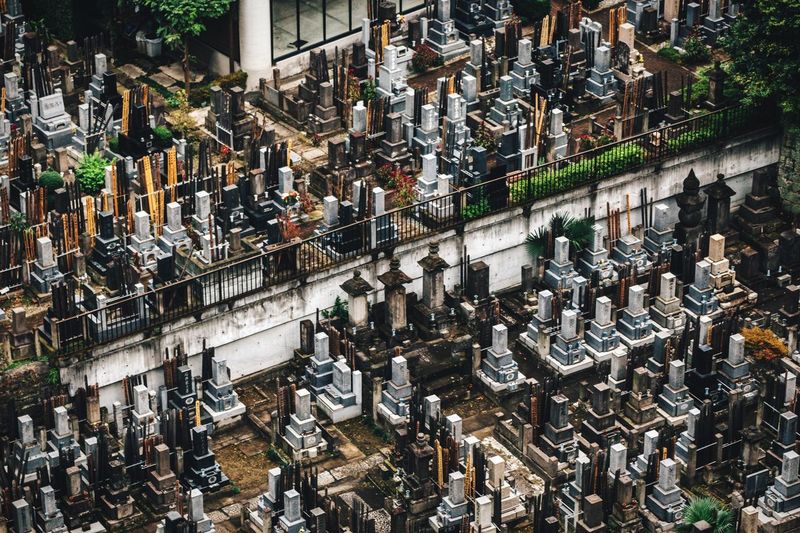 High angle view of tombstones at cemetery