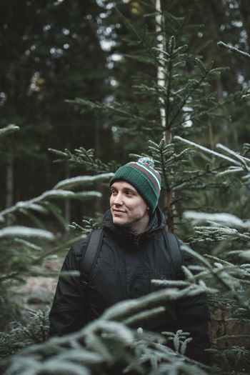 Man standing in forest