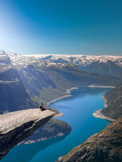 Scenic view of trolltunga mountains against sky