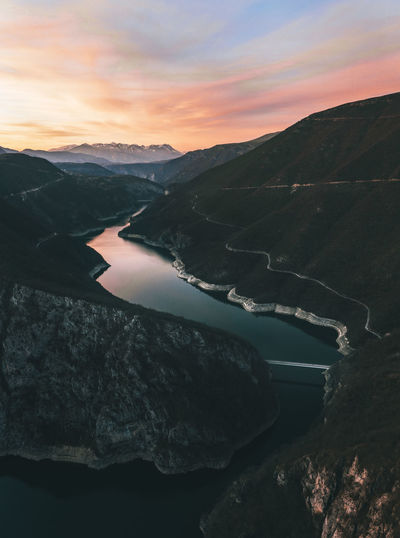 Scenic view of mountain against sky during sunset
