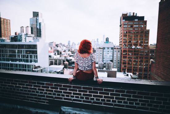Woman looking at cityscape