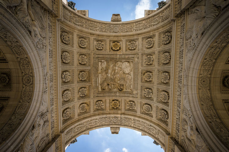 Directly below shot of triumphal arch