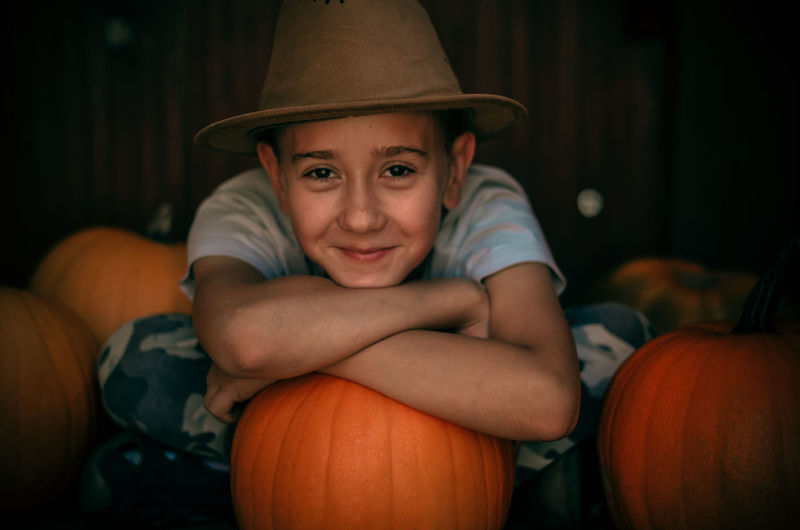 Portrait of happy boy with hat