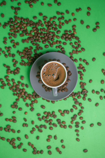 High angle view of coffee cup on table