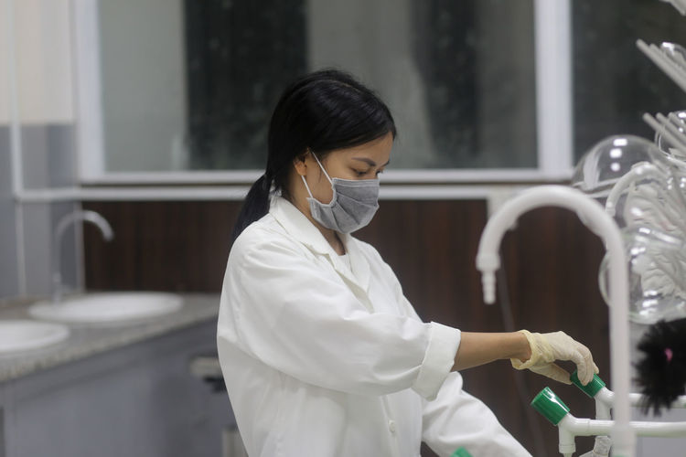 Asian woman scientist working in the laboratory