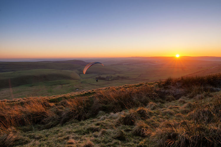 Scenic view of sunset against sky