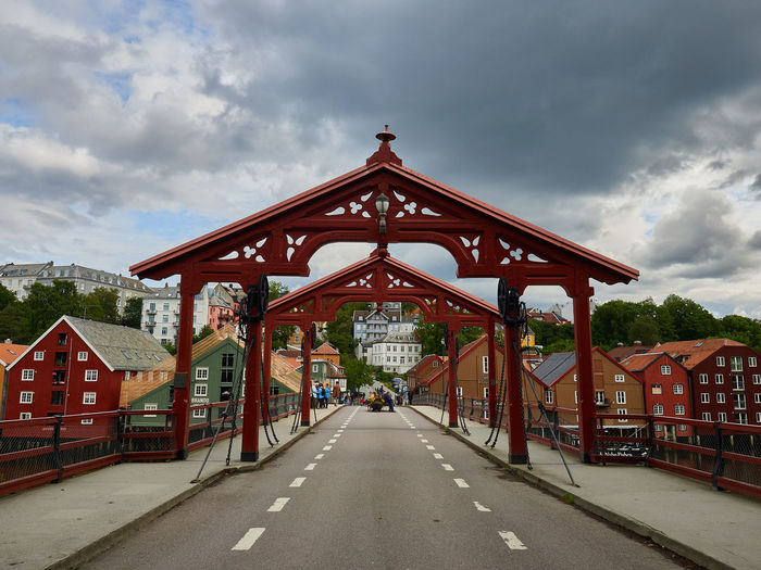 Low angle view of bridge against buildings