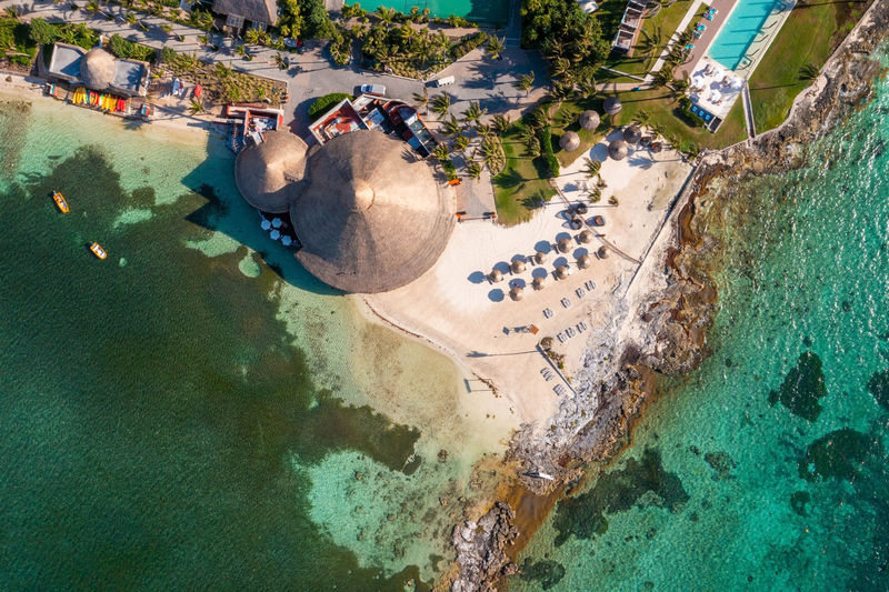 Aerial view of the beautiful resort by the sea coral reef.