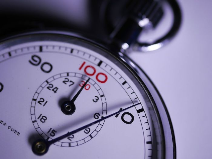Close-up of stopwatch on table