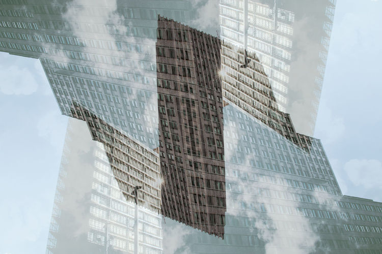Digital composite image of buildings against sky
