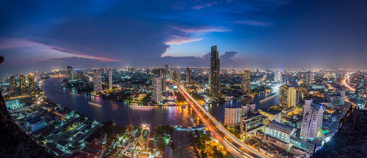 Fish-eye view of illuminated city at night