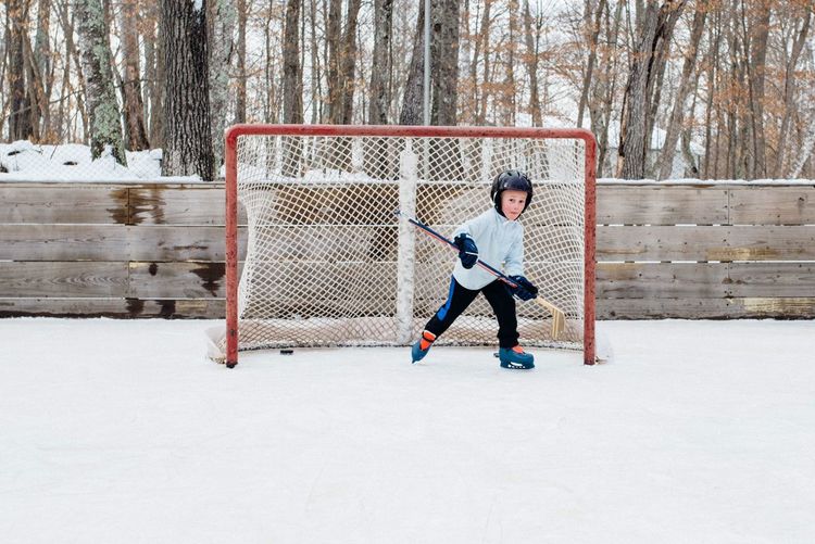 Portrait of boy playing ice hockey