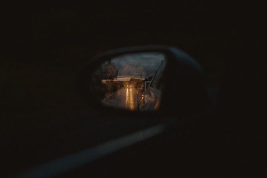 Close-up of illuminated car window