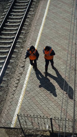 High angle view of men on floor
