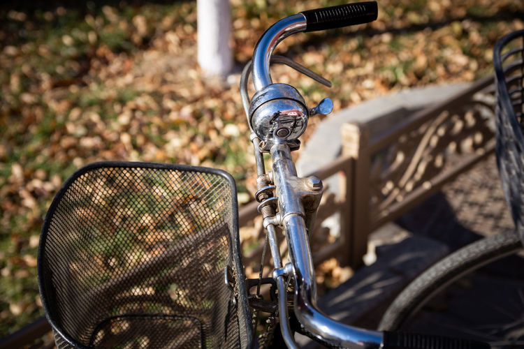 Close-up of bicycle with basket outdoor