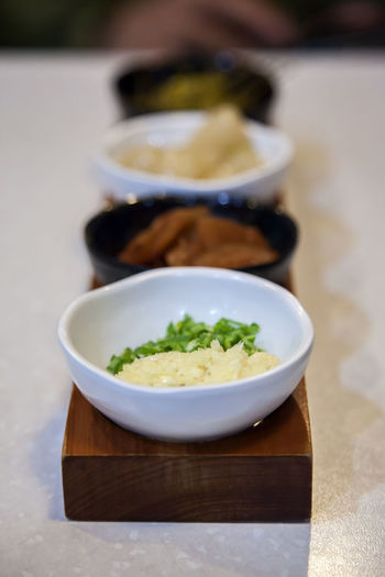 Close-up of served side dishes