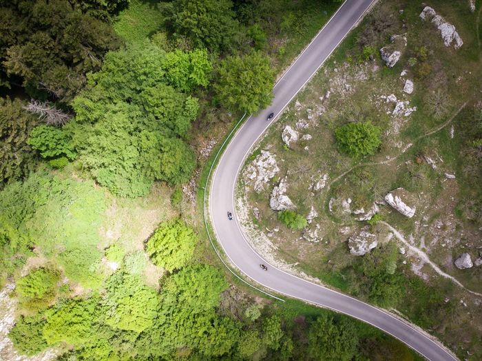 Aerial view of motorcycles on country road