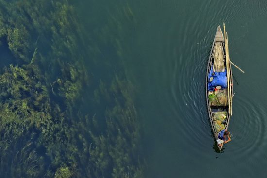 High angle view of people in boat on lake